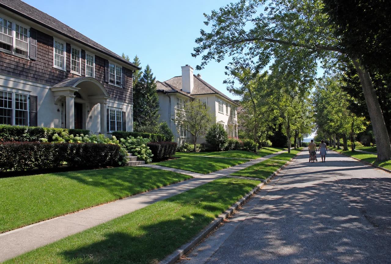 Quiet Wilmette street of stately homes with manicured lawns near Lake Michigan